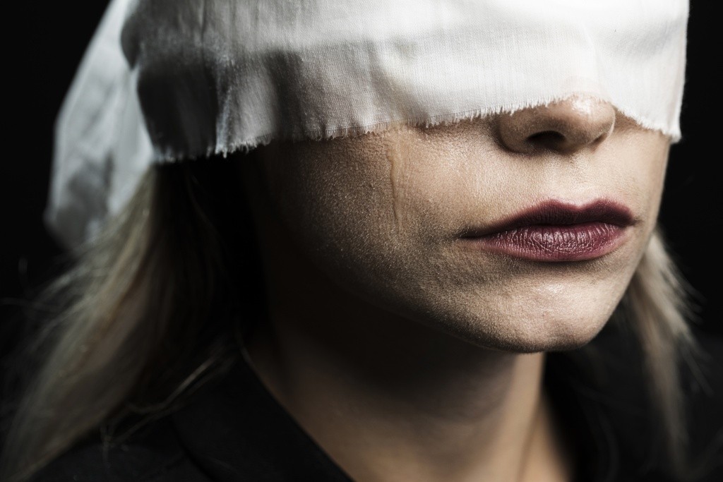 close-up-woman-with-white-blindfold.jpg
